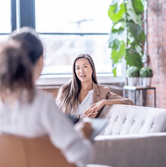 therapist creating personalized treatment plan with client