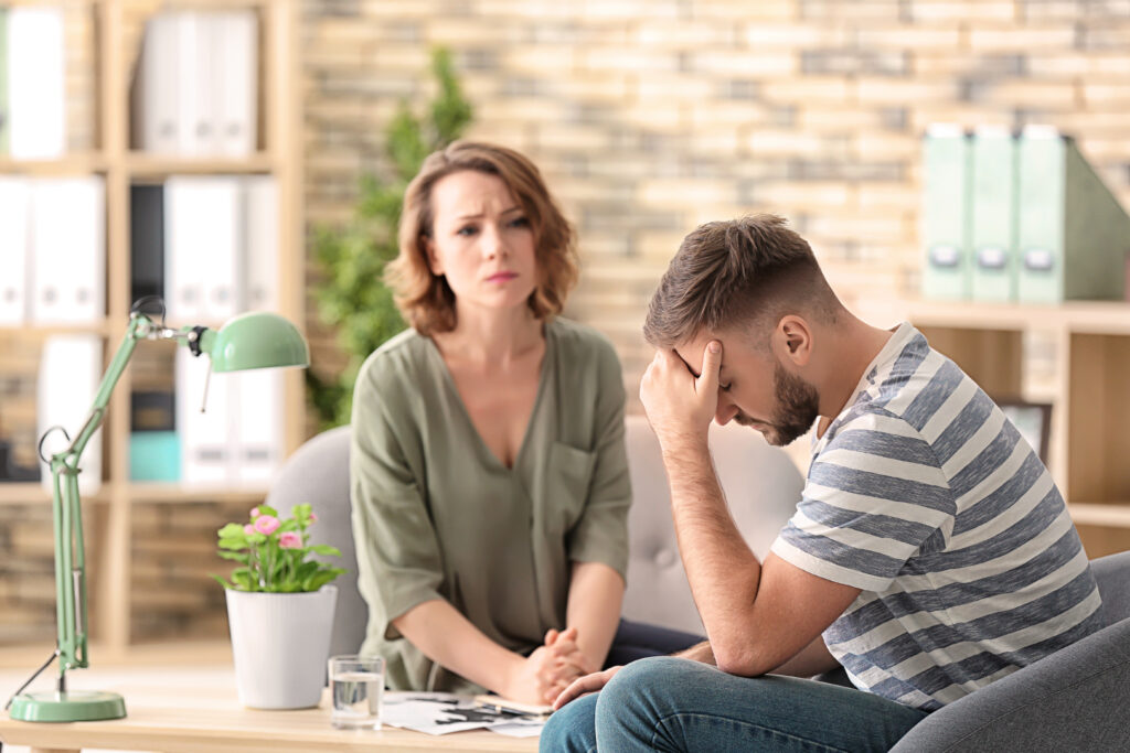 female psychologist working with patient in office