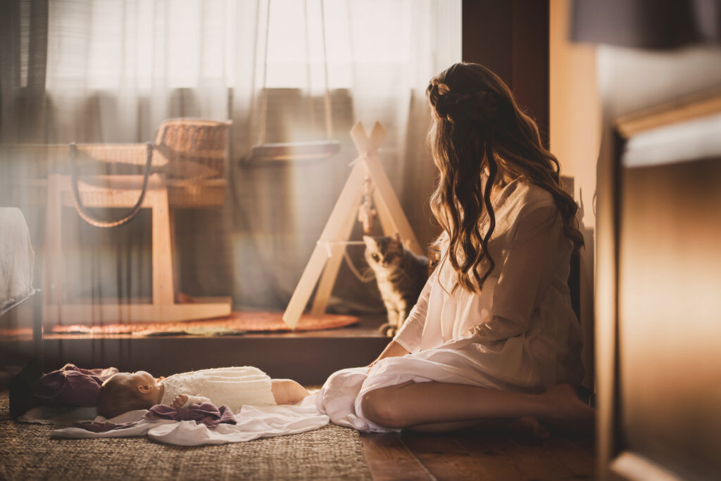 mother and little baby girl in the bedroom