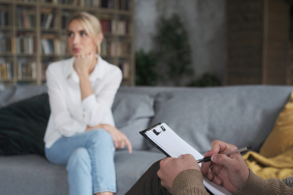 Professional male doctor listening pensive woman patient discussing medical mental health. Man lawyer consulting sad female to legal divorce process winning. Job business occupation informal meeting