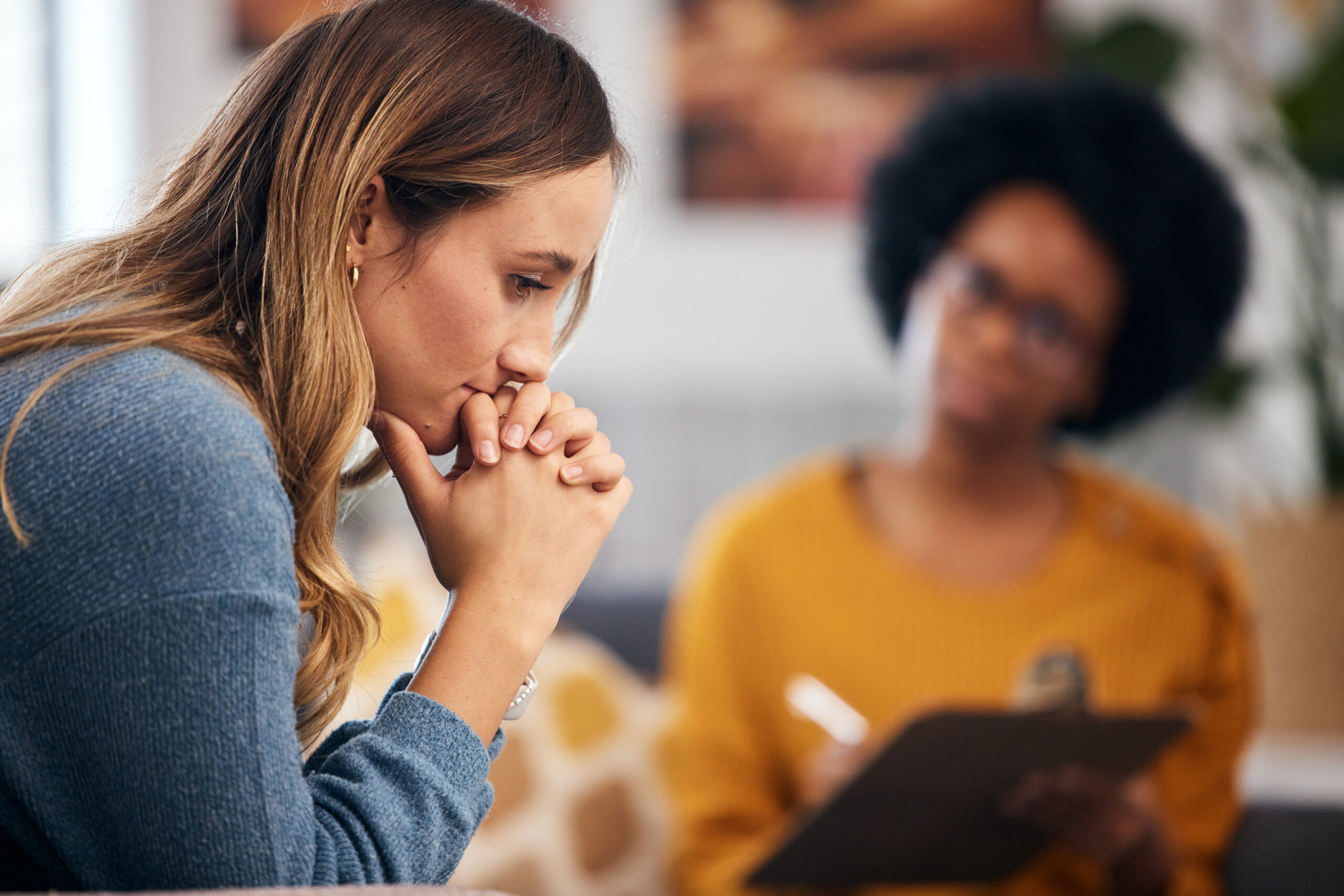 woman thinks during her coaching session