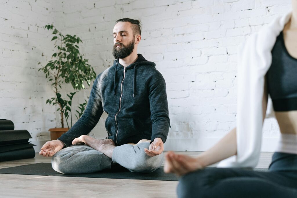 man practicing mindfulness through meditation