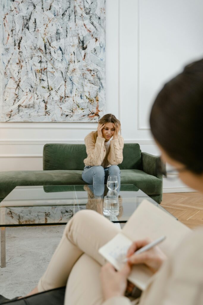 therapy session with young lady who looks upset