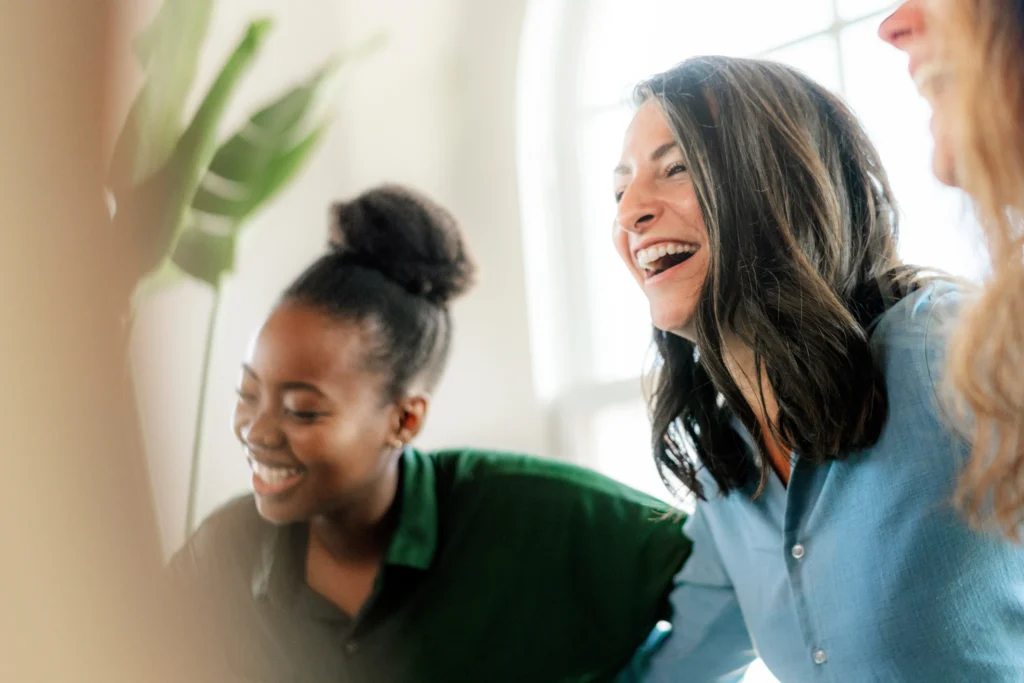 woman laughing with her friend