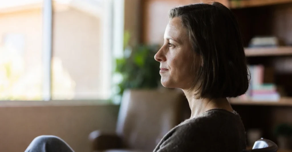 Woman in a calm therapy setting at Redefine Wellness preparing for qEEG Brain Mapping in Scottsdale