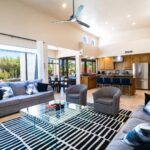 Open living room and kitchen at Tortuga, a residential location for men